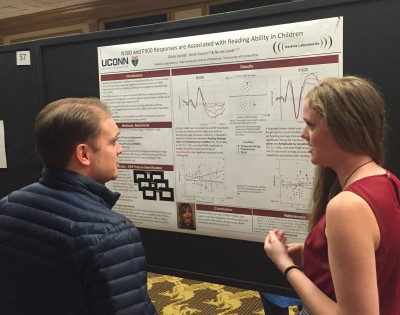 Olivia presenting her poster