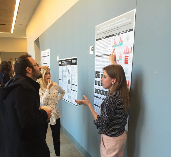 Cassandra presents a poster